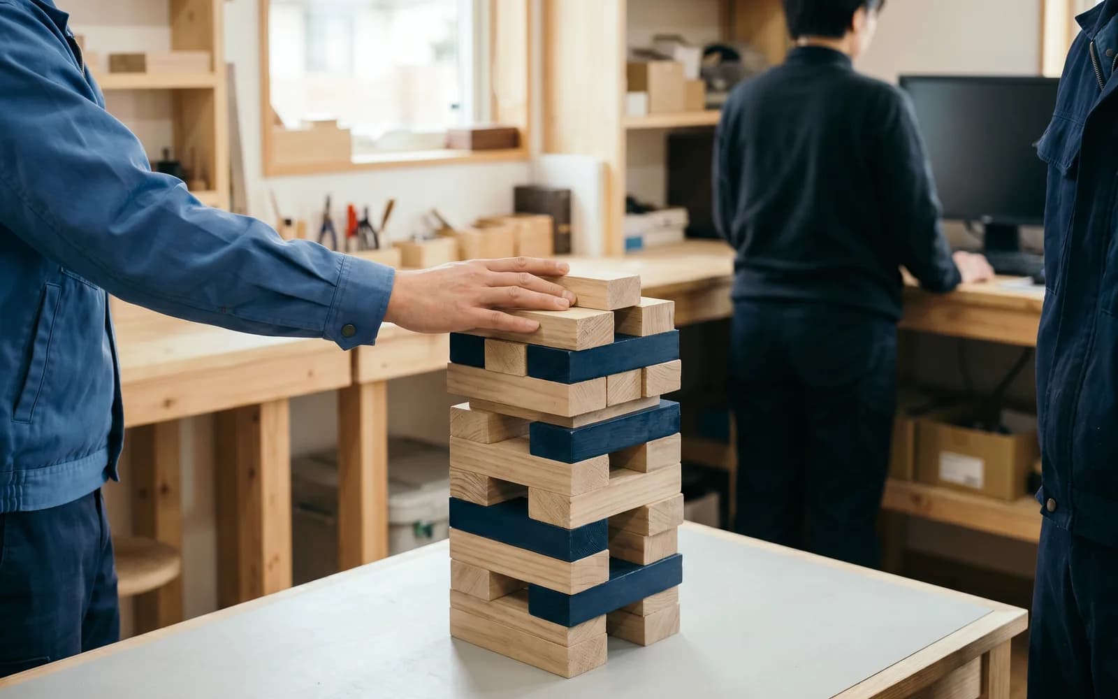 Extra pieces threaten to topple a finished stack — fending off feature creep